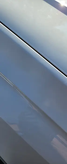 Audi Q7: kras langs de portierrand na het herstel